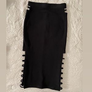 Black pencil skirt with cut sides